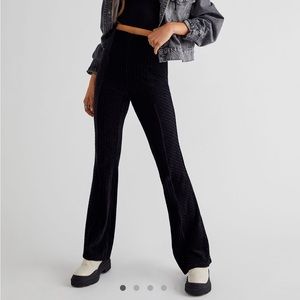 NWT Free People slim pull on velvet flare pants black size medium. New with tags
